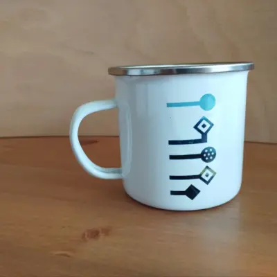 Taza esmaltada – Tiza y Peonza